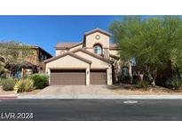 Two-story house with three-car garage at 9622 Staff Ln, Las Vegas, NV 89178