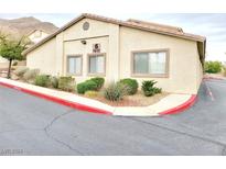 Exterior view of a two-story building with landscaping at 2050 N Los Feliz St # 120, Las Vegas, NV 89156