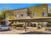 Two-story building with covered parking and landscaping at 1852 N Decatur Blvd # 202, Las Vegas, NV 89108