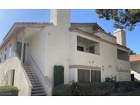 Two story building with stairs leading to entrance at 1321 Del Mar St # 4, Las Vegas, NV 89119