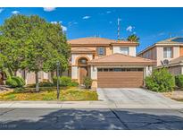 Two-story house with a brown garage door and well-manicured lawn at 7566 Catalina Harbor St, Las Vegas, NV 89131