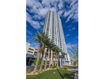 High rise building with palm trees and signage at 200 W Sahara Ave # 810, Las Vegas, NV 89102