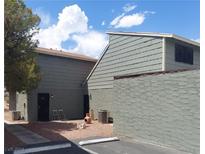 Rear view of the property showing a patio area and building exterior at 5107 Greene Ln # L/B, Las Vegas, NV 89119