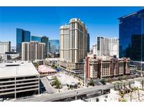 Aerial view of building, showcasing surrounding cityscape and hotels at 145 E Harmon Ave # 1121, Las Vegas, NV 89109