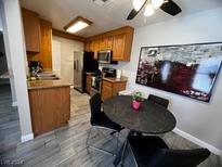 Kitchen with granite countertops and stainless steel appliances at 1515 E Reno Ave # A107, Las Vegas, NV 89119