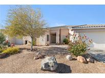 Charming single story home with desert landscaping at 3589 Cottage Canyon St, Laughlin, NV 89029