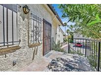 Private patio with wrought-iron gate and access to parking at 3604 Di Salvo Dr # 127, Las Vegas, NV 89103