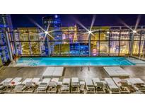 Luxury rooftop pool and lounge area with city views at 3722 Las Vegas Blvd # 809, Las Vegas, NV 89158
