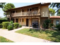 Two-story home with balcony and well-maintained landscaping at 3077 Pinehurst Dr # B, Las Vegas, NV 89109