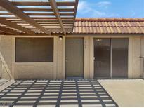 Ground level condo entrance with covered patio at 1868 Avacado Ct, Henderson, NV 89014