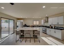 Modern kitchen with stainless steel appliances and large island at 4729 Bennett Dr, Las Vegas, NV 89121