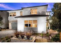 Stunning two-story home with modern design and landscaping at 9003 Shifting Skye St, Las Vegas, NV 89166