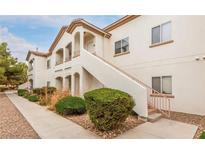 Exterior view of building with walkway and landscaping at 5650 E Sahara Ave # 2049, Las Vegas, NV 89142