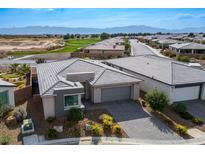 Aerial view of a modern home in a residential community at 4746 Se Argent Hills Ave, Pahrump, NV 89061