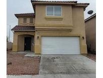 Two-story house with attached garage at 8701 Shady Pines Dr, Las Vegas, NV 89143