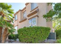Two story home with landscaping and AC unit at 1516 Faldo St # 1516, Las Vegas, NV 89128