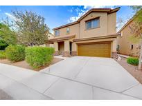 Two story house with attached garage at 3881 Burma Rd, North Las Vegas, NV 89032
