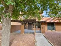 Spanish-style home with a covered patio and walkway at 210 Shadybrook Ln # B, Las Vegas, NV 89107