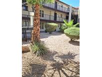 Building exterior with landscaping and courtyard at 2080 Karen Ave # 86, Las Vegas, NV 89169