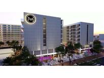 Modern building exterior with retail space on the ground floor at 924 S First St # 404, Las Vegas, NV 89101