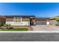 Single-story home with two-car garage and landscaped yard at 8337 Sonora Del Sol St, Las Vegas, NV 89113
