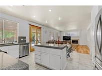 Spacious kitchen features an island and stainless steel appliances at 1211 Red Jade Ct, Henderson, NV 89014
