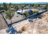 Aerial view of a modern home with large lot and solar panels at 7135 Polaris Ave, Las Vegas, NV 89118