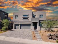 Modern two-story home with gray exterior and attached garage at 510 Duvet Ct, Henderson, NV 89012