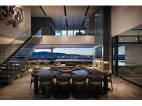 Spacious great room boasts city views, a fireplace, and ample seating at 607 Alpine Summit Dr, Henderson, NV 89012