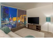 Modern living room with city views and large windows at 3726 Las Vegas Blvd # 1601, Las Vegas, NV 89158