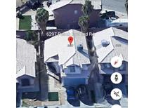 Aerial view of two story house and address at 6297 Peach Orchard Rd, Las Vegas, NV 89142