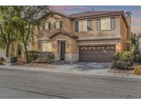 Two-story home with a brown door and attached garage at 1838 Shining Elm Ct, North Las Vegas, NV 89031