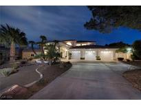 Elegant two-story home with three-car garage and landscaped front yard at 7421 Silver Palm Ave, Las Vegas, NV 89117