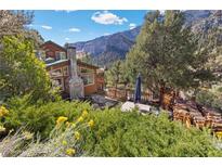 Mountain home with wrap-around deck, patio and firepit at 324 Crestview Dr, Mount Charleston, NV 89124
