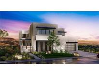 Modern home exterior with landscaped yard and driveway at 659 Overlook Rim Dr, Henderson, NV 89012