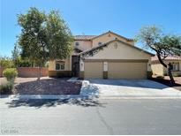 Two-story house with attached two-car garage at 5905 Cabo San Lucas Ave, Las Vegas, NV 89131