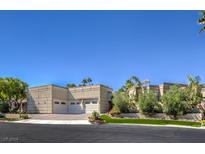 Luxury home with three-car garage and mature landscaping at 2017 Slow Wind St, Las Vegas, NV 89134