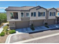 Three-unit building with attached garages and balconies at 7334 N Decatur Blvd # 6, North Las Vegas, NV 89084