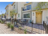 Private patio with seating and built-in grill at 6816 Alpine White Ct, North Las Vegas, NV 89086