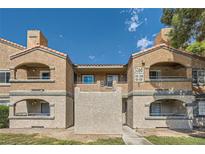 Exterior view of a two-story building at 5260 Mission Monterey Ln # 203, Las Vegas, NV 89107