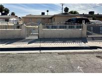 House exterior with gated entrance and small front yard at 1804 Jansen Ave, Las Vegas, NV 89101
