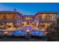 Luxury estate with a large pool and fire pit at 27 Eagles Landing Ln, Las Vegas, NV 89141