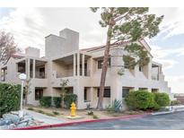 Two story building with balconies and a landscaped courtyard at 3859 Desert Marina Dr # 257, Laughlin, NV 89029