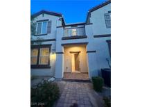 Two story home with balcony and landscaping at 1198 Narrow Gorge Ct, Henderson, NV 89002