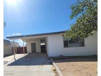 Single story home with covered carport at 4555 Payson Ave, Las Vegas, NV 89115