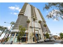 Highrise building exterior view with street-level businesses at 200 Hoover Ave # 812, Las Vegas, NV 89101