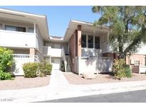 Two-story building with stairs leading to the entrance at 698 Oakmont Ave # 1310, Las Vegas, NV 89109