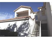 Exterior view of building with stairs and private balcony at 75 N Valle Verde Dr # 225, Henderson, NV 89074