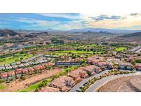 Aerial view of luxury community, showcasing homes with mountain views at 22 Via Vasari # 101, Henderson, NV 89011
