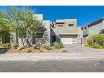 Modern two-story home with stone and stucco exterior at 198 Shaded Canyon Dr, Henderson, NV 89012